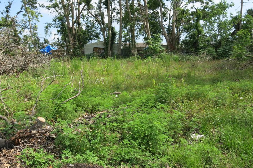 Vacant lot with public water and sewer, close to schools, and shopping.  Double wide mobile home originally on the property has been removed.  Owner has a letter from the Planning department stating that it is ok to put a mobile home back on the property.