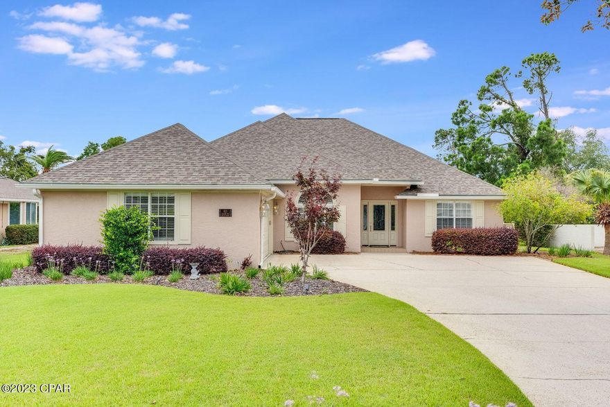 Currently under contract, seller accepting backup offers. Welcome to this stunning 3 bedroom, 2 bath home boasting exceptional craftsmanship and luxurious features. 

The standout feature of this property is the high-end  pool, complemented by a hot tub and a screened enclosure. The pool measures an impressive 30' by 14', providing ample space for swimming and recreation, while the 8' wide hot tub offers a soothing and luxurious retreat. The meticulously landscaped yard is perfect for outdoor gatherings and activities.

With a split floor plan, this home offers optimal privacy and functionality. The custom crown molding adds a touch of elegance to the main living space, which also features built-in cabinets. The separate dining room provides a formal setting for entertaining guests, while the cozy family room with attached sunroom offers an inviting space to relax and enjoy the surroundings.

The master suite is a true retreat, featuring a walk-in closet and a luxurious ensuite bathroom with dual sinks, a soaking tub, and a separate shower. The two additional bedrooms are spacious and well-appointed, with ample closet space and easy access to the second bathroom.

Additional features of this home include a side entry 2-car garage, a laundry room with sink, plantation shutters, hardwood floors throughout main living areas, and  2 X 6 construction. 

Located in desirable Bay Point, this property is close to shopping, dining, and top-rated schools. The neighborhood features: 24-hour roving security and the gates are manned. Bay Point has a full-service marina, tennis courts, playgrounds, walking trails and a 18 hole golf course plus restaurants and Bluegreen's Bayside Resort and Spa.

Roof 2018, HVAC systems 2018 and 2015, Water Heater 2020