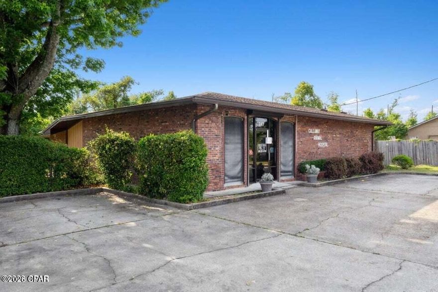 High-Visibility Commercial Building in the Heart of Bay County

Excellent opportunity to own a 2,768 square foot commercial brick building situated on a large .446-acre corner lot offering easy access and outstanding exposure. Located on a high-traffic roadway with an estimated 8,099 vehicles per day, this property delivers prime visibility in the heart of Bay County.

The site provides ample existing parking with abundant room for additional parking, building expansion, or added warehouse space. The building has long operated as a well-established animal hospital and features an entrance lobby, multiple exam rooms, offices, break room, two bathrooms, and boarding rooms.

The versatile layout allows for a wide range of potential uses, including medical or dental office, HVAC, plumbing, electrical, or other professional or service-based businesses. Property improvements include two HVAC units, a tankless water heater, and a commercial-grade Generac Guardian generator. The roof and HVAC systems were replaced in 2019, offering peace of mind for a new owner.

This is a turn-key commercial building offered at a fantastic price—ready for your business to move in and grow.