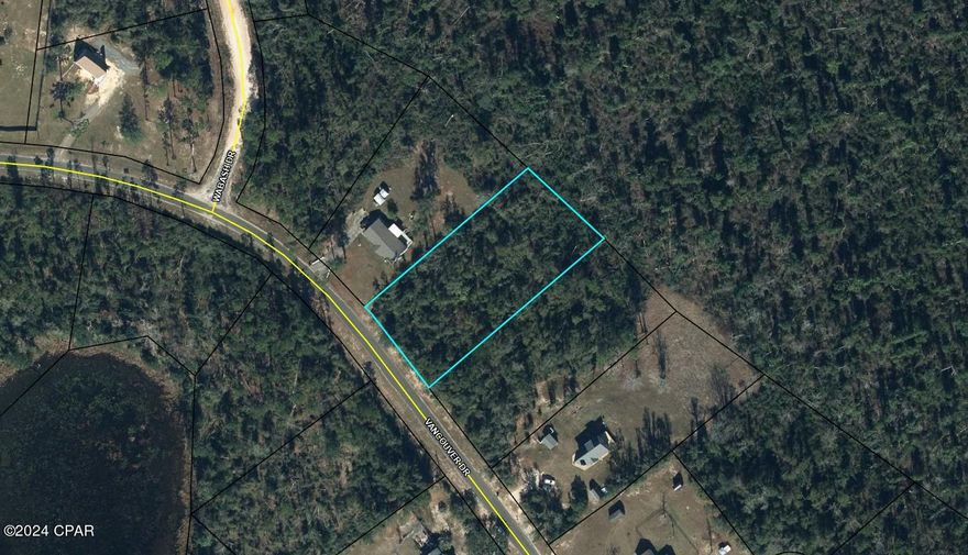 Wonderful building lot in the unique community of Compass Lake in the Hills. Lot is on a paved street and is located close to the main lodge area. No mandatory HOA but if you choose to be a member you will have access to all the amenities that the association offers. These include swimming pool, tennis courts, cabin rentals, RV spaces, and more. Quiet, peaceful country living, yet still a reasonable commute to Panama City and all that is offered there. Buyer to pay title insurance, closing fee, and doc stamps on the deed.