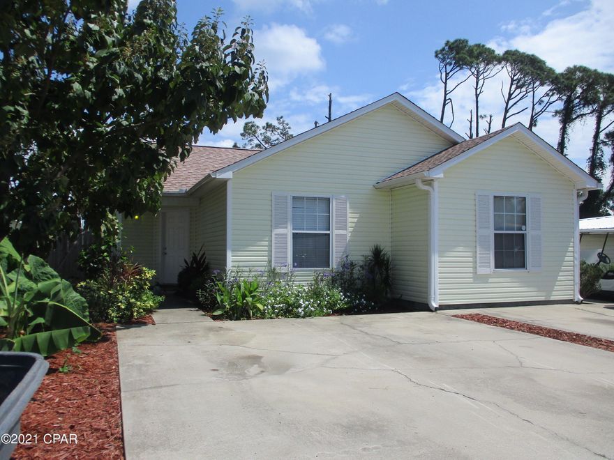 CURRENTLY UNDER CONTRACT, SELLER ACCEPTING BACKUP OFFERS' Contemporary style duplex for sale in Panama City Beach! The perfect location  between the beach and Grand Lagoon!  New roof, plenty of parking, each side with new hot water heaters, fenced in backyards and new paver patios! 6100 is a 2/2 spilt floor plan with plank flooring, laundry closet for side by side washer/dryer (not included) and 2017 HVAC.  6102 is 2/1.5 split plan with new paint, tiled floors, stackable washer/dryer (included) and 2018 HVAC.   6100 has month to month tenant and 6102 is leased until Feb, 2022.  Perfect to live in one side and rent the other or rent out both! YES, short term rentals are  allowed and NO HOA!  Do NOT go without an appointment (dogs).  Interior pictures coming soon. Call today!