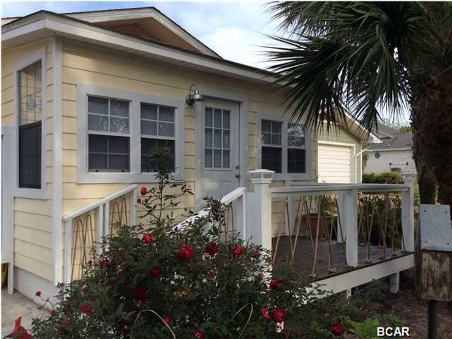 PRICE REDUCED!  MOTIVATED SELLER!  Gorgeous beach cottage that has been totally updated with new plumbing and electrical work. Kitchen and baths have been renovated. The kitchen has stunning butcher block counter tops. The flooring has beautiful engineered Burch Wood throughout. This home has the designer's touch and move in ready. There is a storage building behind the house with ample storage. Both the front and back have new decks. All appliances stay and other furnishings are negotiable. The lot is large and has plenty of room to put in a pool or special landscaping design. This home has much to offer and the beach access is a very short walking distance. This home is on the quiet west end of Panama City Beach and is located on a dead end street.  is stunning with all the upgrades. A must see! Also, close proximity to both scenic 30A and Pier Park.