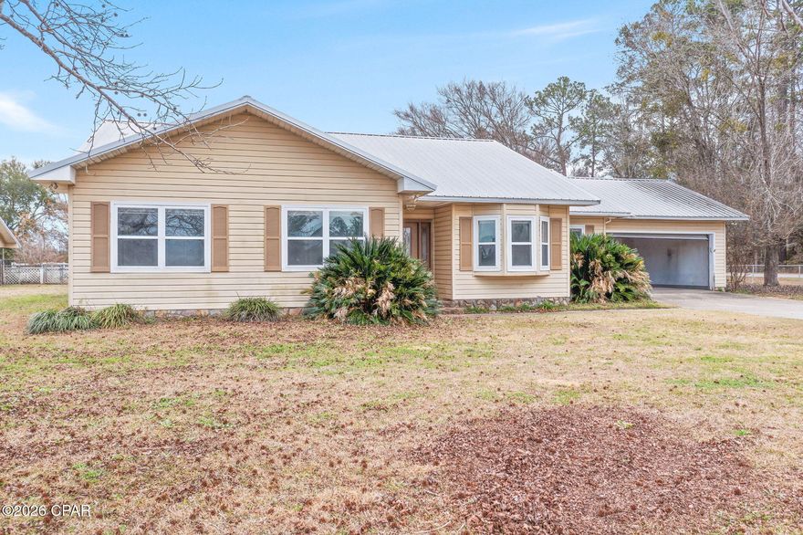 Located just minutes from town, this inviting 3-bedroom, 2-bath home sits on a spacious 1± acre lot and offers the perfect blend of comfort and convenience. The open-concept interior features a generous living room with cathedral ceilings, a well-appointed kitchen with breakfast bar, and a heated and cooled sunroom overlooking the pool area—ideal for year-round enjoyment. The oversized master suite is a true retreat, complete with a walk-in closet, custom-tiled shower, and separate Jacuzzi tub. Outdoor amenities include a 16x32 inground pool, rear patio, barn, attached garage and a fully fenced yard. Conveniently located just a short drive from schools, shopping, and dining, this property is ready to welcome its next owners.