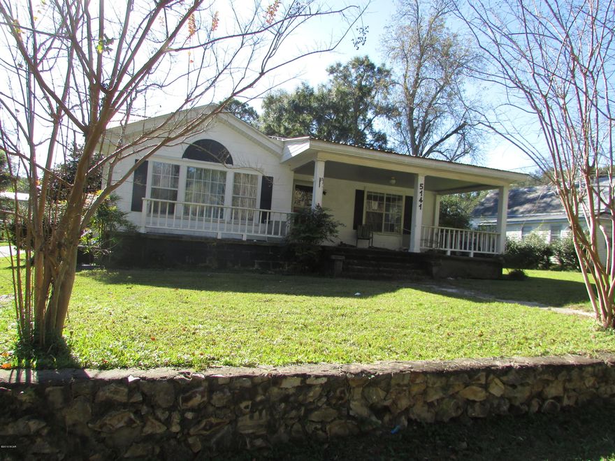 County Home in Greenwood. 4 Bedroom 2 Bath home with 2170 Sq ft located on almost 1 acre close to City Park! Screen Porch, Covered Patio, Storage Building Newer Metal Roof. Hardwood Floors and ceramic tile floors! Fireplace to keep warm during the winter nights. Detached 3 car carport, fenced yard