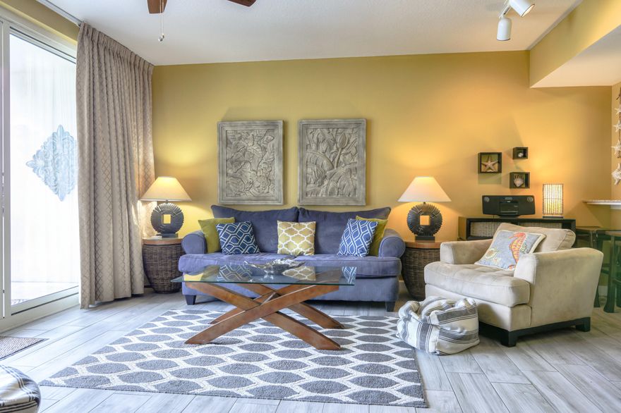 Take in peaceful, elevated water views in this stunning Shores of Panama Condo. Offering a lovely living room and master bedroom with direct pool and Gulf views and a private bunkroom. Additionally, two full baths make for wonderful ease of living. Enjoy welcoming, beautifully furnished spaces with new wood look flooring, upgraded lighting, and vibrant color scheme. Relax by the pool or in the inviting living room or sip a cool drink out on the spacious oversized balcony and gaze at the pool and Gulf beyond. Amazing open floor plan with rare layout. Residents and guests of Shores of Panama enjoy resort-style amenities including a pool, fitness center and beach access. Shores of Panama is a 23 story Tuscany style condominium of gulf front luxury accommodations offering unparalleled amenities including almost 500' of Gulf frontage, 13,966 sq. ft. million dollar Gulfside, zero-entry lagoon-style gulf side pool, Gulf side hot tub, large heated indoor pool & hot tub, Covered on-site parking deck, Health center with fitness equipment, sauna, full-service spa and steam room, Two tiki bars serving lunch and dinner, Beach activities and rental services, Free high-speed internet access,  and more, surrounded by beautiful exterior details. The Shores of Panama is an excellent location on the beach next to Pineapple Willy's and is within walking distance of other restaurants and entertainment. Like thousands of visitors each year, your family will LOVE Shores of Panama. 
Turnkey and ready to rent. Convenient fourth floor deeded parking space included with the unit. Fantastic investment opportunity! This will not last!