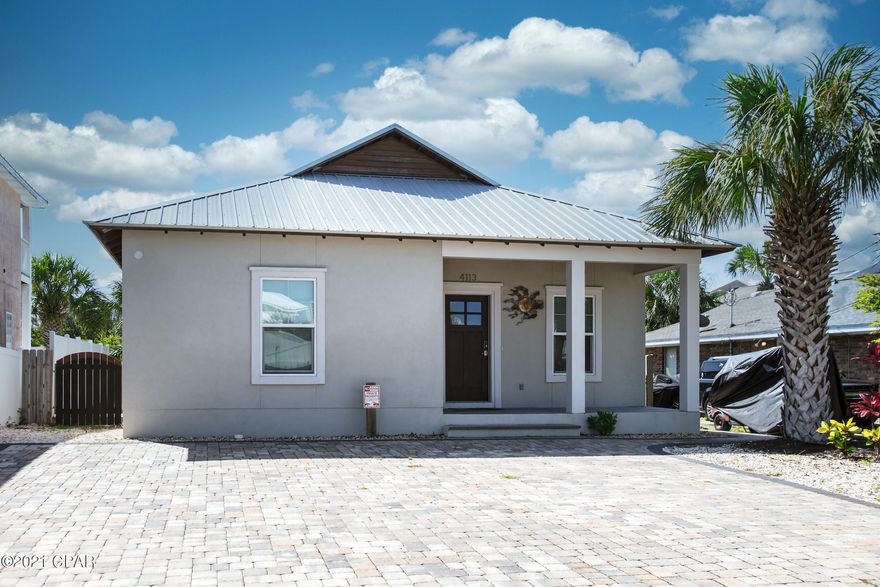 CURRENTLY UNDER CONTRACT,SELLER ACCEPTING BACK UP OFFERS

LOCATION, LOCATION, LOCATION. Walkway 19 on Surf Drive is only 80 steps from the driveway. This home has been a  full time residence since  it was built 4 years ago. It would make a great full time residence or it would be a tremendous vacation rental because it is so close to the beach. The beauty of this home starts with the large stone paver driveway. The flooring is a wood look Alava tile. The kitchen has curava solid surface countertops and stainless steel appliances. The bathrooms have beautiful vanities with marble tops. It has a large family room that is completely open to the kitchen. The back yard is completely fenced with a privacy fence. The stone walkway runs from the driveway all the way to the back into a stone patio