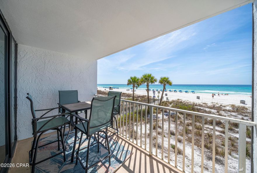 Looking for that hidden gem that offers the most amenities along a white sandy beach with turquoise waters, lower dues and built in rental revenue?  How about just steps to the sand, no elevator required?  Windward 105 is it!  Edgewater Beach Resort is Panama City Beach's only full-service resort with 11 pools (10 heated seasonally), including a large tropical lagoon-style beachside pool with lush landscaping, waterfalls and private cabana rentals, a kids' splash pad, four gulf-front hot tubs, 10 plexicushion tennis courts, 5 pickleball courts, 10 shuffleboard courts, basketball court, an executive par-3 golf course, a robust fitness center, electric car charging stations, tram service around the property, Ocean's Restaurant onsite with poolside service, Edgie's market (Starbuck's) for treats and essentials, a conference center, and more all behind a gated complex with 24-hour security. 

The Windward building is a low-density, mid-rise condominium that sits on the quiet, far west side of the Edgewater property.  Owners and guests get the best of both worlds; private and peaceful open beach space with all the amenities just a short walk or tram ride away.  No elevators are required, as this unit is on the coveted 1st floor just steps away from the beach.  W-105 is the only 1-Bedroom/2-Bath unit with this floor plan currently available, which has the *LOWEST* HOA dues in Leeward/Windward. The condo offers 816 square feet of living space and comfortably sleeps 4. The floor-to-ceiling beachside glass and patio door was replaced in 2024 to meet current hurricane and turtle glass standards (not many units have this upgrade).  The south-facing view offers both sunrise and sunset, giving you unparalleled beauty from the private covered balcony any time of day.  Views of the pier, seagulls, dolphins at play, peaceful tides rolling in, it's all here!  Step inside the unit and immediately take in the stunning Gulf views from the living, dining and kitchen areas. The kitchen has updated Diamond cabinets, granite countertops, stainless steel appliances and comes fully stocked with everything needed.  It overlooks the living and dining area with a built in breakfast bar, creating the perfect setting for entertaining. The Master Bedroom Suite offers a private bath and a laundry area with a new stackable washer and dryer, adding extra convenience for longer stays.  The second bathroom is large and located away from the living area.  Both bathrooms have the same Diamond cabinetry and granite countertops as the kitchen for a cohesive aesthetic.  The wood-look tile floor throughout the unit allows for easy upkeep.  The hot water tank was replaced in 2020. The HVAC is from 2018 and has been on a maintenance contract (2 routine visits per year) since the owners purchased the unit in 2019. This condo is sold fully furnished and rental ready, making it an excellent turnkey investment or a luxurious second home.  New furniture and upgraded mattresses in the bedroom and on the sleeper sofa ensure continued guest comfort.  The unit has a proven rental history with many repeat guests.  Rental actuals can be provided upon request (see agent to agent remarks). The current rental bookings for 2026 date out until August, with more bookings being added every day, and they can convey with the sale if the Buyer chooses to use the same rental management company.