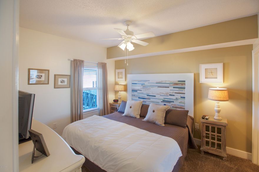 STUNNING 2 BEDROOM 2 BATH CONDO LOCATED IN ONE OF THE MOST POPULAR RESORTS IN PANAMA CITY BEACH FL. DESIRABLE 5TH FLOOR CONDO RECENTLY RENOVATED WITH NEW PAINT, TILE AND CARPET IN BEDROOMS AND DEN. NEW HOT WATER HEATER. NEW CODED DOOR LOCK. NEW STAINLESS APPLIANCES. AMENITIES INCLUDE MULTIPLE INDOOR/OUTDOOR POOLS, WATERFALL, JACUZZI, KIDDIE POOL, STATE OF THE ARTS FITNESS CENTER/SAUNA, MOVIE THEATER, REC ROOM, OWNERS LOUNGE, POOLSIDE BAR & GRILL, SNACK BAR.