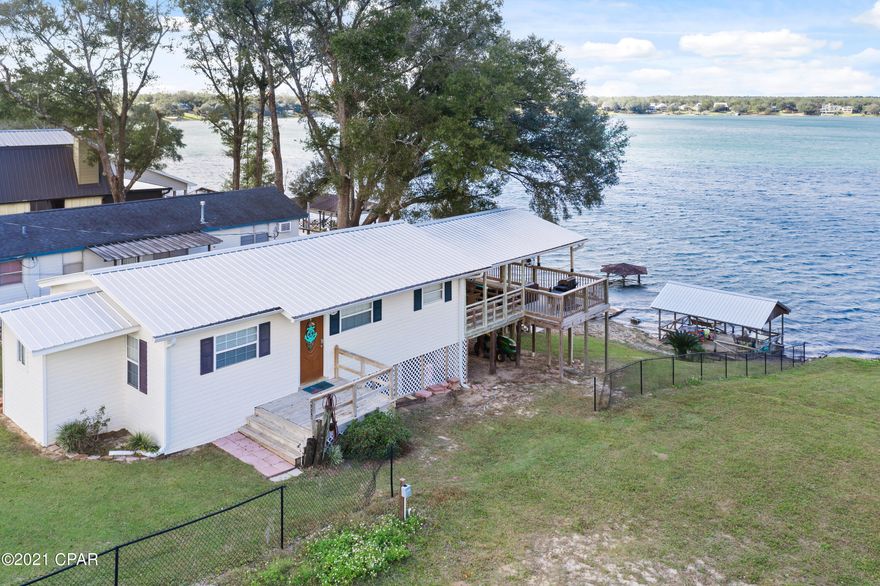 'CURRENTLY UNDER CONTRACT, SELLER ACCEPTING BACKUP OFFERS' Don't miss this opportunity to own your personal piece of paradise!! This 2 bedroom/ 2 bathroom waterfront home on stunning Crystal Lake is a rare find.  Home has had lots of updates to include, new roof (Dec 2018), new HVAC & Ductwork (Jan 2019) and plumbing has been re-piped (Feb 2019).  Whether your looking to relax or entertain guests, the massive deck covers it all with a beautiful water view.  Deck boasts fans, lighting, outlets and even has a TV mounted outside.  There is also a pavilion at the water, that offers the perfect shade on those hot summer days.  Crystal Lake is boat-friendly, so come ready to enjoy fishing, skiing, swimming or even a sunset cruise. This property would be perfect for full-time residents or make a great vacation home. Call today to set up your personal viewing!!

**The well has shared access with adjacent property owners, per the deed.  This is normal for the area.**