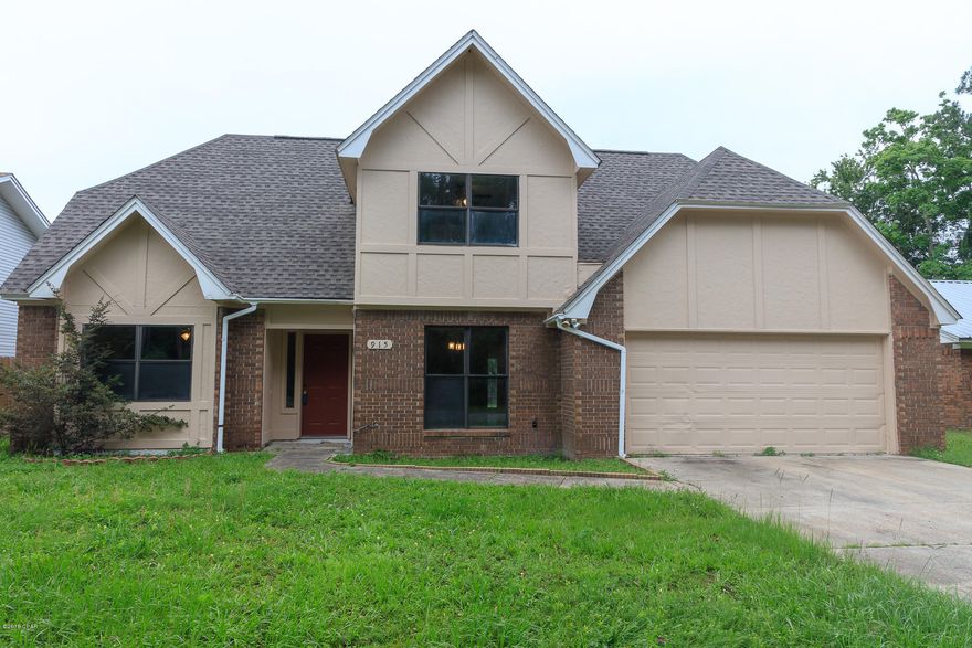 THIS BEAUTIFULLY REMODELED TWO-STORY HOME IS CENTRALLY LOCATED AND ONLY MINUTES TO TYNDALL AFB!  The first floor features a spacious living room with a wood-burning fireplace and new laminate flooring; a completely updated kitchen with new cabinets, granite counters, stainless-steel appliances and eat-in kitchen; an adjoining formal dining room; a large Master bedroom with a new tiled Master bath; a laundry room and two-car garage.  The second floor has three additional bedrooms and a full bath with walk-in attic storage closets, as well.  The entire home has been freshly painted, new roof, new carpet, fogged windows replaced, and the family will enjoy the fenced backyard.  This home has so much to offer and it is move-in ready!!