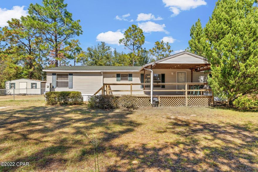 **CURRENTLY UNDER CONTRACT, SELLER WILL CONSIDER BACKUP OFFERS** -   Looking for property in the country yet close enough to town, schools, and shopping?  This may be the one!  Situated on 3.6 acres, this home is equipped with a newer HVAC 2018, newer well, Roof replaced 2019,  Water Heater 2 yrs old, Pergo flooring, and washer/dryer. The deep freezer is also included along with the kitchen appliances.  Side yard is chain link fenced and the 20x12 shed is equipped with electrical.  The propane tank(90lb) is rented from Superior and is used for the gas stove (2014).  Tank rental is about $44 a year; refill cost depends on amount used.   If measurements deemed important, please verify.