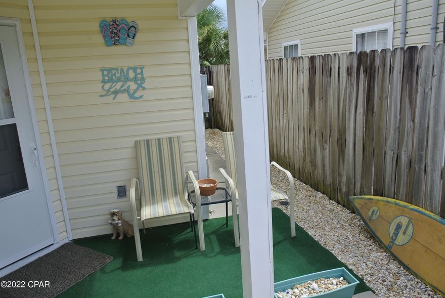 REDUCED!!!! LOCATION!! LOCATION!!  This income  producing duplex is one block off Thomas Drive! It's literally a 3 minute walk to the worlds most beautiful beaches and Rick Seltzer Park! Tucked between The Grand Lagoon, and the Gulf of Mexico, This 4bd 4bth unit, has nearly 900sqft per side, with split bedroom floor plans, private courtyard entrances, privacy fenced back yards, great outdoor spaces, and a site build storage shed on owners side. A new roof in 2019, that was upgraded this year to new code standards. Brand new Accordion style, High Impact, Hurricane shutters installed, that also lower insurance rates! Complete remodel on rental side, newer stainless steel appliances on both sides, and two new washer/dryer units! Golf cart friendly!  It's ready to rent! The owners are also offering a two year Home Warranty on both sides! And yes, it covers the HVAC and water heaters.  And did we mention the Halo UV Air Sanitation/Purification System? Lots of extras here! A great investment opportunity!