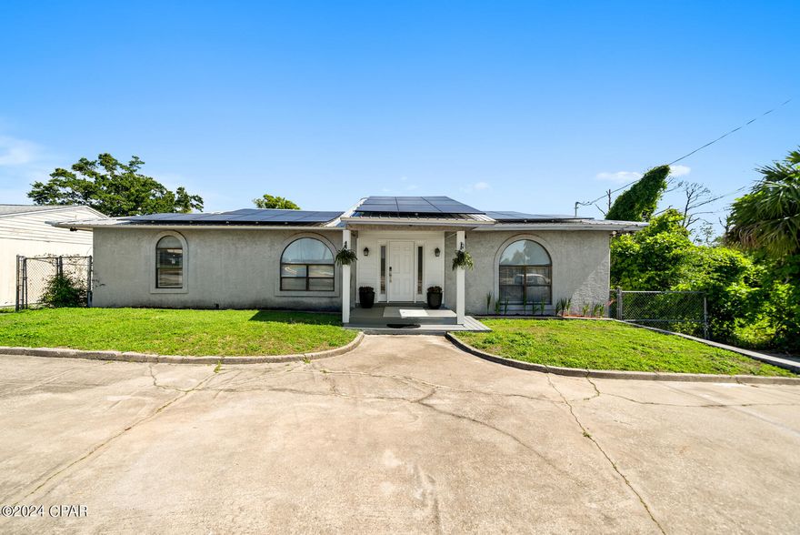 Charming 3-Bedroom Home with Unique Features and Prime Location at 911 E. 7th St., Panama City! 

Discover the perfect blend of comfort and convenience at this delightful 3-bedroom, 2-bathroom home situated in the heart of Panama City. Whether you're looking for a residential haven or a commercial investment, this property has the potential to be zoned for both. This home has beautiful LVP flooring, butcher block countertops and updated cabinets with ample space. The home comes equipped with fully paid-off solar panels, offering sustainable energy solutions and significant savings on utility bills along with a mini-split ac unit in the master bedroom for extra cost efficient heating and cooling. Adequate space is readily available with a rare ''Florida basement'' adding functionality to this charming home. Enjoy entertaining family and friends on the spacious balcony or backyard. Located directly across from the hospital, this home provides unparalleled convenience for healthcare professionals or anyone needing quick access to medical facilities. With a canal running behind the property, enjoy tranquil kayaking right from your backyard. This canal runs to Watson Bayou with Gulf Access. This property is not just a home; it's a lifestyle. 
Perfect for families, professionals, business owners or investors, seize this unique opportunity to own a versatile and beautifully situated property in Panama City. Contact us today to schedule a viewing!

Key Points:
-New roof Dec 2018
-HVAC Replaced 2017 (Inside & Outside Units)
-Water Heater 2020
-Paid off Solar Panels

Ask about the special program for buyers in this specific area!