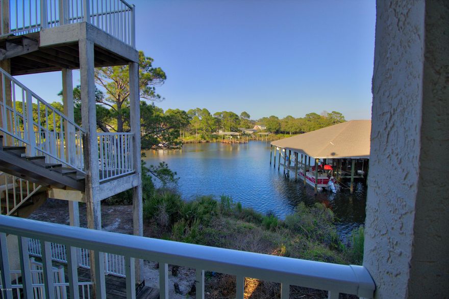 Awesome waterfront townhouse with single car garage! Ground level features small room and 1 full bath with access out to private patio area with water views. This room can have many users as in office or den. 2nd level features living room, kitchen and half bath with private balcony over looking the lagoon. 3rd level includes master bedroom with many windows overlooking lagoon and on suite bathroom. The 3rd floor also has additional bedroom and full bathroom. The property includes pool and marina!