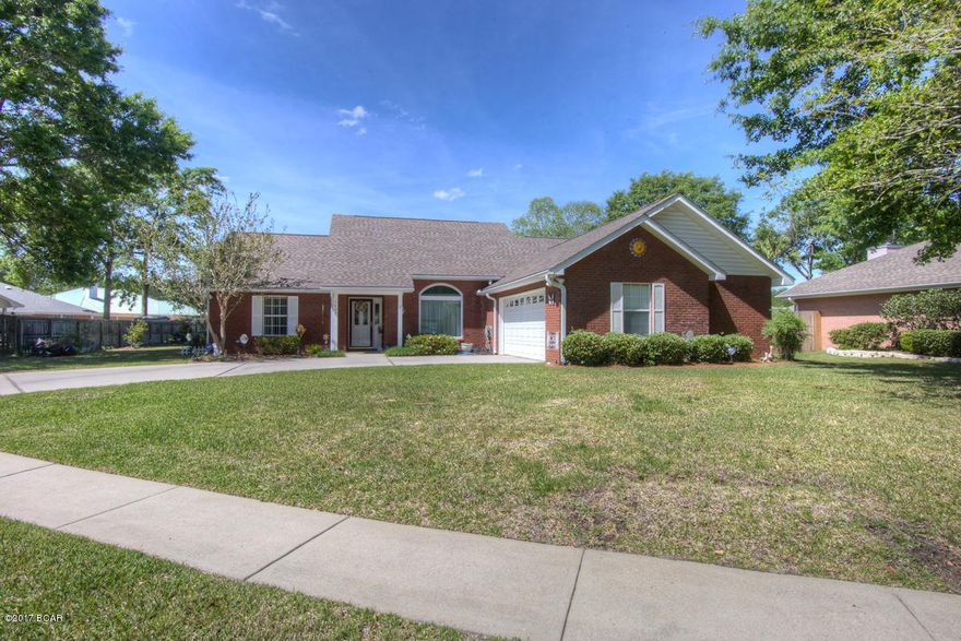 MOWAT HIGHLANDS! HOME WARRANTY INCLUDED BY SELLER. This beautiful all brick home shows like new. Pride of ownership comes through in every detail...10 foot high ceilings in the living room with crown molding throughout the living room, dining room and foyer. High quality wood laminate in living areas and tile flooring in the kitchen and baths.The large kitchen boasts granite counter tops, and plenty of cabinets, a built-in office nook and opens to the large breakfast area. The Master bath has a beautiful deep whirlpool bath and separate shower, pocket doors give easy access and more room. The hall bath has double vanities and the utility room a deep sink! A New Roof in 2016, New Windows in 2014, and a large Florida room built in 2015 (not included in sq. footage.) The yard is nicely landscaped yet easy to care for, add in the sidewalks and this is one great property, that won't last long.