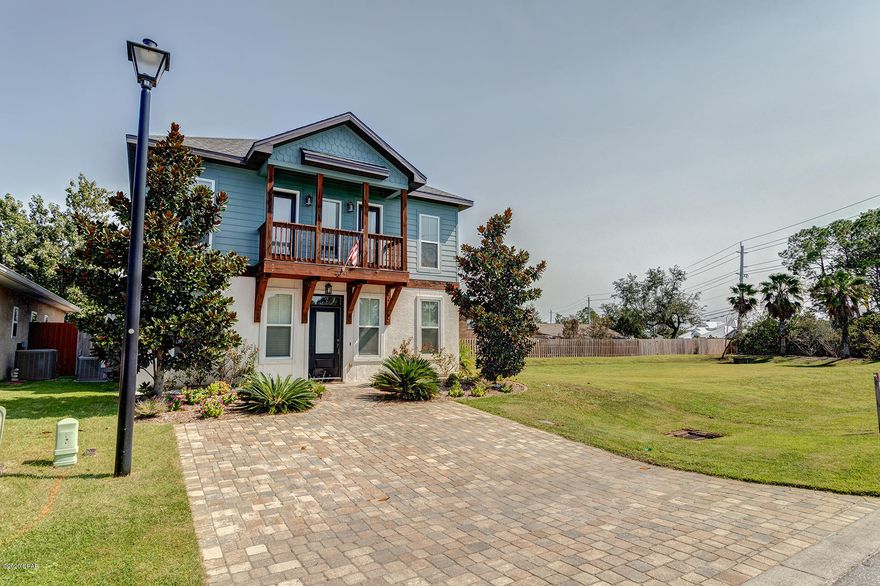 Stunning Rosemary Beach Style Florida cottage. 4 bedroom 2½ bath home has an open floor plan with large living area. Main living area features wood look tiles floors and 9-foot ceilings. The kitchen is well appointed with stainless appliances, dark wood cabinets, granite counter tops, and walk in pantry. Dining area features patio doors overlooking the fenced backyard. The first floor also includes a half bath and large owners retreat. The master bedroom includes walk in closet. Master Bath is also huge with double vanity sink, separate shower, and a cast iron claw foot tub. On the second floor are 3 bedrooms,bathroom, laundry room, and open area that could be an additional living area, office, play room... The front 2 bedrooms share a balcony- perfect for relaxing and watching the sunset. The exterior of the home is constructed of stucco and hardiboard siding, paver driveway, covered back patio, fenced backyard with storage building.

The Hidden Lagoon community includes a pool, clubhouse, and barbecue area. Hidden Lagoon subdivision is tucked away on dead end street off North Lagoon close to restaurants, entertainment & grocery, and is near the Navy Base and Beach. All sizes and measurements are approximate-buyer to verify if important.