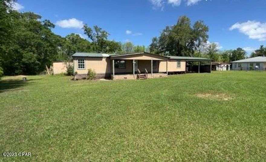 3BR/2B Fixer Upper on .96 Acre. This mobile home has large rooms with bonus room that could be 4th bedroom, sitting room off master bedroom and a large enclosed back porch across the back of home. Great location and just a short drive to grocery, food, hardware store and schools. The dead lakes is nearby for the fishing enthusiast. Being Sold ''AS IS''. Motivated Seller.