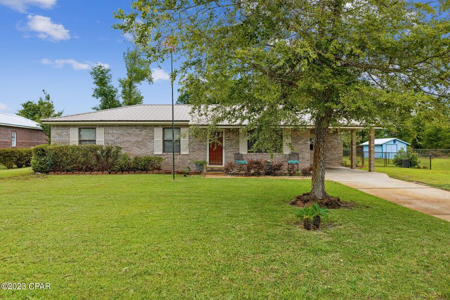 **Open House this Sunday October 22nd from 1-3pm** Welcome to 1210 Georgia Avenue! This beautifully updated (One Owner) brick home is the epitome of comfort & ease. With an open floor plan & large brick fireplace, this home is an entertainer's dream.

Entering the front door, the Kitchen & Dining Room welcome you in. Featuring granite countertops, soft-close cabinets & drawers, and stainless steel appliances, the Kitchen is perfect for hosting around the large island & the large open Dining Room allows for your guests to have plenty of room to enjoy a nice meal.

The Living Room is situated toward the back of the home with a large brick fireplace perfect for decorating to your style. Step out of your French Doors to a beautiful Gazebo where you can unwind after a long day. One of the larger lots in Lynn Haven, this fully fenced yard provides ample space to play or garden & the large shed is wired with electricity for easy access to your lawn tools.

Back inside, 3 Bedrooms including a Master Suite that is tastefully designed with dual vanities & a separate shower & soaking tub is the perfect way to end your day relaxing.

In addition to the bedrooms, this home also offers a 4th bonus room, providing endless possibilities for a home office, playroom, hobby space, or even an impressive closet as the current owners use it! Flexibility is key, and this bonus room ensures that you have the freedom to tailor the space to suit your lifestyle. 

New Metal Roof in January 2019 (with Hurricane Clips = Lower Insurance Premiums), New Large 4 Ton AC Unit in Spring 2020, & separate Well for Irrigation add to the benefits of this home!

Conveniently located in Lynn Haven, this home provides quick access to local parks & other amenities. Don't miss the opportunity to make this beautiful home yours.