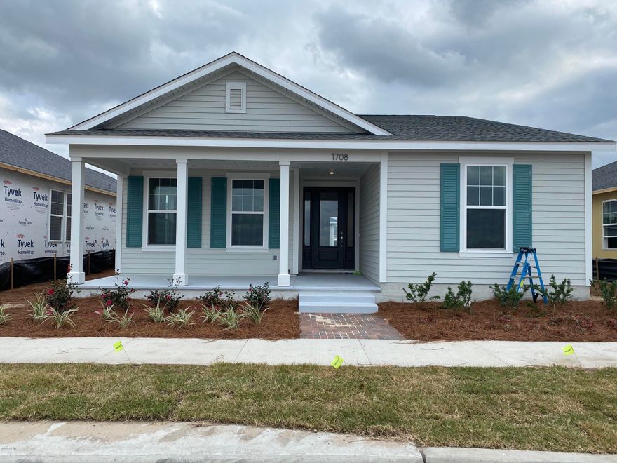 The Orchid model is an incredible open contemporary 3-bedroom / 2-bath floor plan. Granite countertops & stainless steel appliances give the kitchen a polished finish. Nice laundry room is off the kitchen. Features a living area off the large covered back porch and separate dining space. Large master suite with tray ceiling, double sinks, walk in tiled shower, linen closet, & walk-in closet. Great covered porches on the front of the home and the back. Many great design possibilities for your back yard space + fences allowed. Energy efficient & low insurance rates! Enjoy the sense of community at SweetBay with parks, amphitheater, resort swimming pool, basketball court, ponds, sidewalks and trail system that leads to North Bay! Top-rated K-8 University Academy is located within SweetBay!