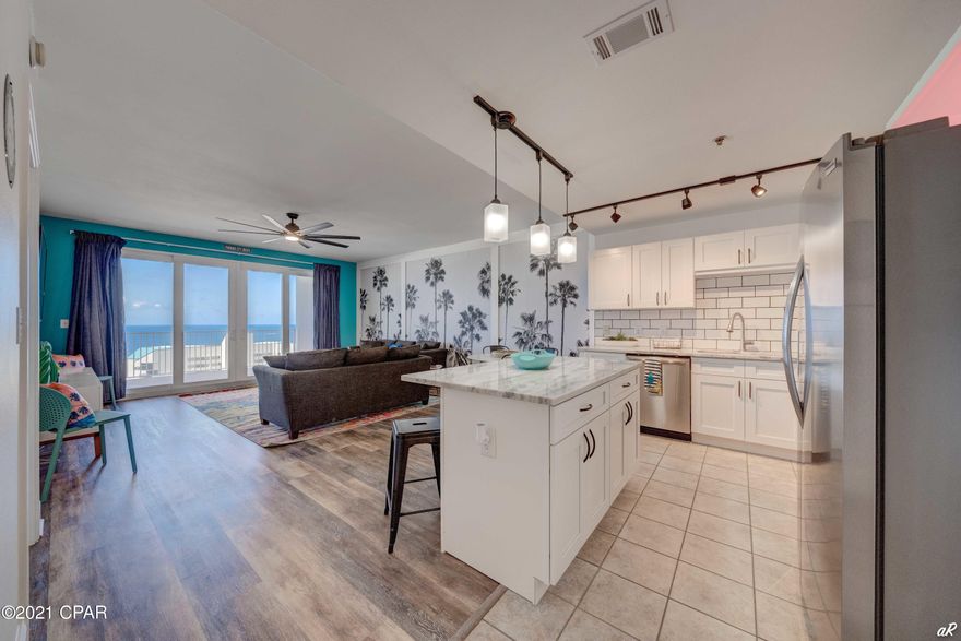 CURRENTLY UNDER CONTRACT, SELLER ACCEPTING BACKUP OFFERS. SPECTACULARLY RENOVATED Three Bedroom Gulf view unit at Laketown Wharf Resort!!!! This Amazing Unit Boasts Over 1600 SQF Of Living Space That Includes A Large Gulf View Master Bedroom, With Direct Access To The Extra Large Balcony, Two Additional Bedrooms + Plus Bunk Room And Three Full Bathrooms. Recent Upgrades to include; All New Stainless Steel Kitchen Appliances, Quartz Countertops in the Kitchen, Subway Tile Backsplash, LVP Flooring In All Bedrooms And Living Area, New Furnishings & Lighting Throughout, Plus Much More. Laketown Wharf Resort Itself Is Situated In The Heart Of All The Fun & Excitement In Panama City Beach – Just Steps Away From The World's Most Beautiful White-Sand Beaches, Shopping, Dining & Entertainment. This Beachside Resort Offers Unparalleled Amenities With Convenient Beach Access, 5 Unique Pools, A Kids Funscape Playground, Splash Bar & Grill, Gulf View Fitness Center & Covered Garage Parking. So Don't Miss Out...Schedule Your Viewing Today!!!! All Dimensions Are Approximate And Should Be Verified If Important.