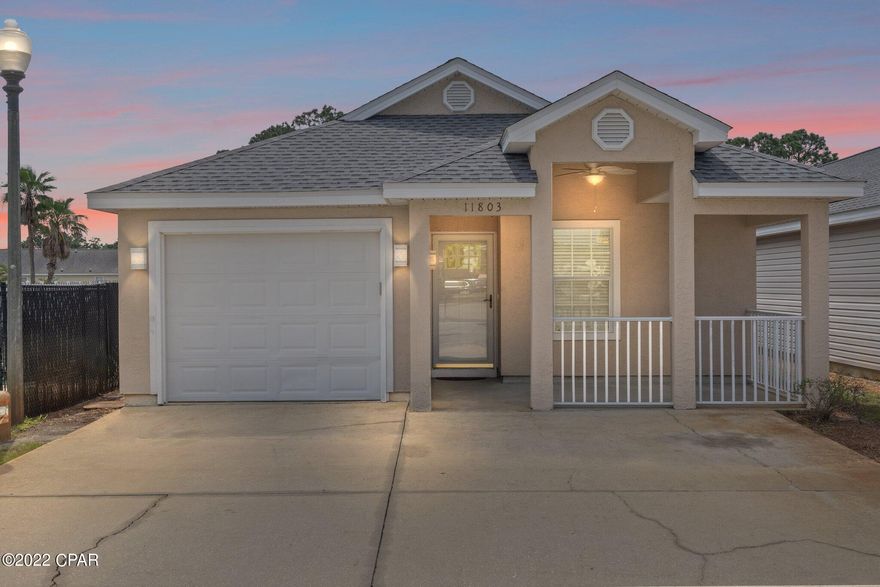 CURRENTLY UNDER CONTRACT, SELLER ACCEPTING BACKUP OFFERS Spacious 3 bedroom 2 bath home centrally located in the Palm Cove subdivision just minutes away from the Beach and county pier. The floor plan has the best design in the neighborhood since it has inside laundry, a pantry and living room that opens to screened in back porch that leads to both pools and cabana  area. Features include screened in porch, new roof, new a/c, new interlocking, waterproof flooring, carpet in bedrooms, extended parking for 3 cars, extra large front porch. Palm Cove is gated community with night time security  onsite.Great location that is centrally located to many beach amenities. . Reasonable HOA fees include lawn maintenance, security at night, upkeep of pools and playground and much more. Great famil Short term rentals are allowed.