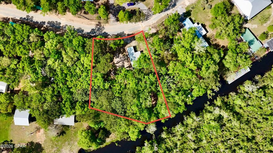 Waterfront opportunity on Black Creek!
 This 3-bedroom, 2-bathroom mobile home sits on over half an acre, offering the perfect setup for an investment property, weekend retreat, or full-time living on the water. Enjoy peaceful creek views with direct access to great fishing right from your backyard.

Located just minutes from the Choctawhatchee Bay, this property is ideal for boating, fishing, and enjoying the outdoor lifestyle. You're also less than 30 miles from Crab Island and the white sand beaches of Destin, FL--giving you quick access to shopping, dining, and entertainment.

The property features a separate electric hookup, providing an excellent opportunity for an additional camper or mobile home, adding even more income potential or space for guests.

Whether you're looking to invest or create your own waterfront getaway, this property offers endless possibilities. Schedule your showing today!

Buyer/Buyer's agent to satisfy themselves to all pertinent information regarding the property.