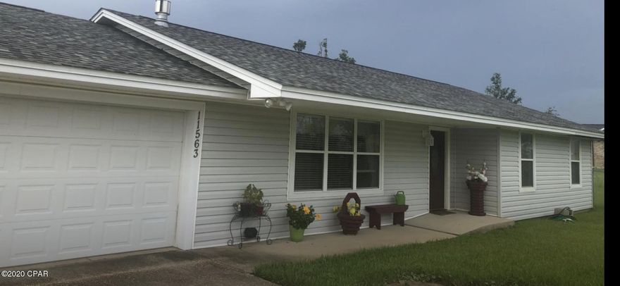 Currently under contract, accepting back up offers. You must see this great home!  $1000.00 painting allowance,This lovely ranch style home is waiting for you,Bathrooms are updated and kitchen is updated with newer cabinets, quartz countertops, and a dual fuel range with gas cooktop, 2 electric ovens (one self cleaning) and over the range microwave.The laundry room/office has a desk and cabinet that stay. The house is handicapped accessible and has ceramic tile floors throughout.Back yard is fenced, there is a safe room on the patio and a steel quonset hut style building plus an outbuilding on the property. New gutters have just been installed on the back of the house. Seller is providing a home warranty to the buyer. Nest security system conveys with the sale of this lovely home. Measurements are approximate and should be measured if important.