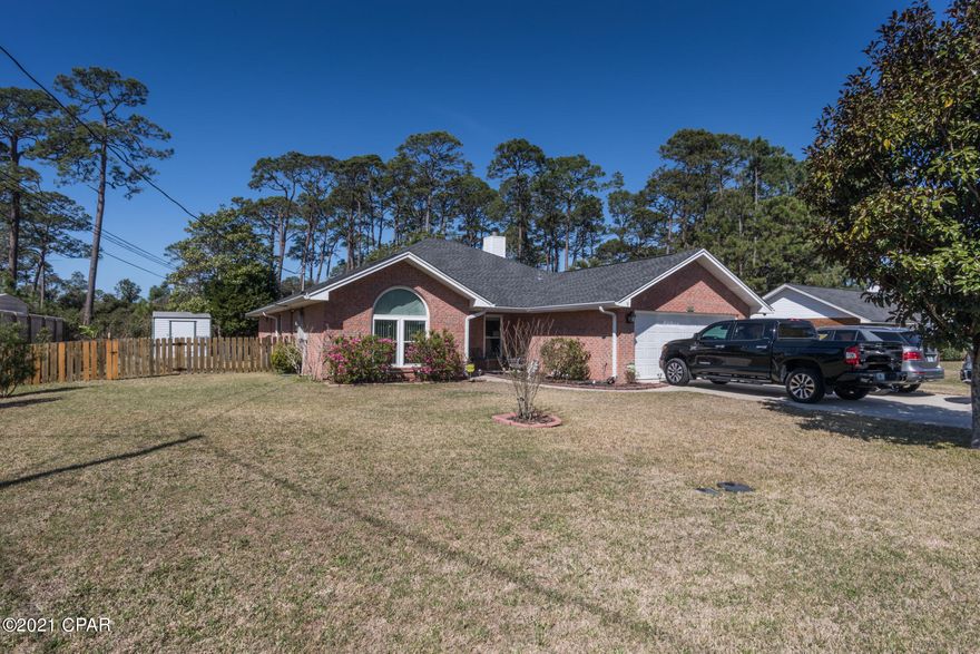 This well kept home in the popular and centrally located Colony Club neighborhood is waiting for it's new owner. The home is conveniently located next to the new Bay Parkway which will carry you directly to Pier Park or Hwy 79 which is only a few miles away. Also, you can take advantage of living right next to the Holiday Golf Course which is located in the neighborhood. The home boasts recent updates which include HVAC system in the last 6 months, replaced windows throughout the house, new LPV flooring in Sunroom and roof that is only 4 years old and is tied down to the foundation for extra support. There is also an outdoor shed for extra storage. Irrigation system works great and is hooked up to its own separate meter.