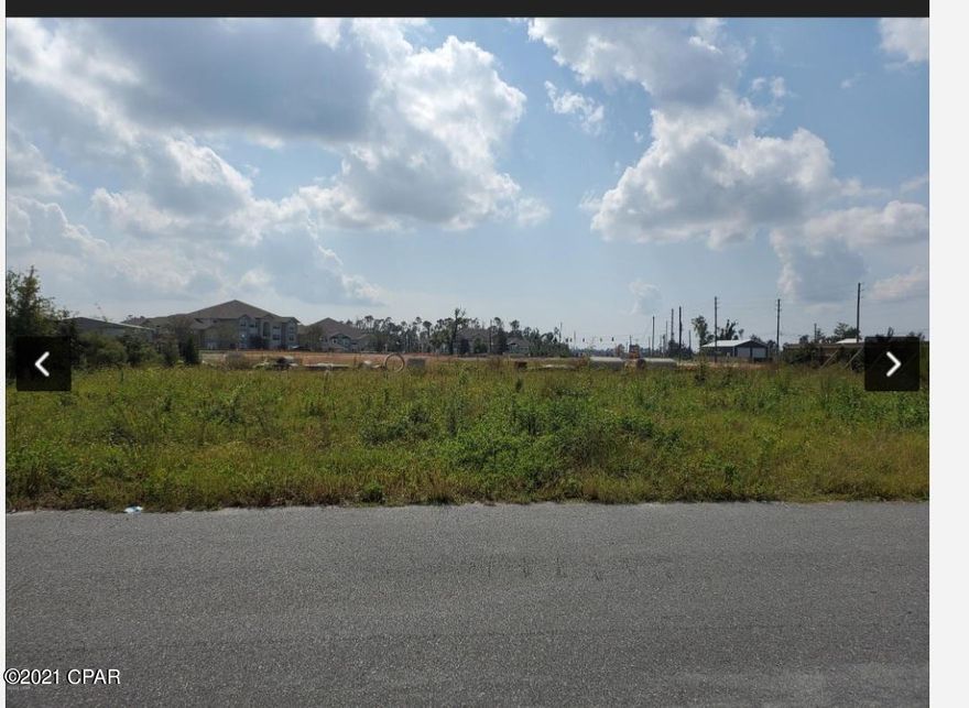 Multi use vacant lot In the heart of up and coming lynn haven. Great spot to build a home or put a manufactured home. Will also suit a smalle office, storage unit, or a money making townhome.The uses are endless! Nice holding pond behind you. Close to the main highway, but not too close. Conveniently located near everything booming right now. Land was cleared and stumps removed in 2019. 3 city water metres already in place. Septic needed or you can possibly tie in to the city. Owner has survey.