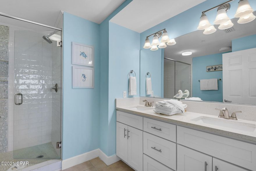 2020 TOTAL CONDO RENOVATION!  Last and Final Offers Accepted till noon 5/25/2021. This is a spectacular 2BR+Bunk Room at Sunrise Beach, one of the most sought after resorts in PCB. The upgrades start with the kitchen and baths with all new cabinets, faucets, sinks, and quartz countertops. New glass and tiled master walk-in shower. All new Samsung stainless appliances. Sunbrella fabric living room furniture and Polywood balcony furniture. HVAC is new and water heater only 3 years  old.  Sleeps 9 with king master, queen guest, bunkroom with twin over full, and queen sofa bed. This is one of the few resorts that has under resort garage parking for all units. It also has some of the lowest HOA fees on the beach and is a top rental resort (condo already has over $42,000 on the books for 2021). It is only 1 mile east of Pier Park and within walking distance of Sharky's and Runaway Island restaurants plus Gulf World. It is also one of the closest resorts to the Frank Brown Recreation Park, where many of the ball tournaments and special PCB events are staged.
Check out the Sunrise HOA budget and capital reserves and you'll see this resort is one of the best managed resorts on the beach (no HOA increases in 3 years and the entire building has been re-painted, and walkways + pool area have been totally resurfaced).  Sunrise is also owner controlled, which means the homeowners own the gym, the pools, and receive income from their beach chair rental. NOTE: ALL INFORMATION AND MEASUREMENTS ARE DEEMED RELIABLE HOWEVER NOT GUARANTEED. BUYER SHOULD CONFIRM ALL INFORMATION.