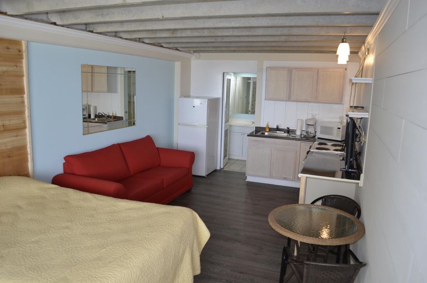 This is a rare opportunity to own your own beach front property for under $80,000. Perfect property to escape to for a weekend retreat, vacation or to be used as a rental investment. This unit was recently painted and updated with new flooring, kitchen cabinets and counter top.  All utilities are included in the monthly HOA fee even electricity.  This unit is located on the westside of the complex with an amazing view of the Gulf of Mexico and breathtaking sunsets and your are just a few steps away from the white sandy beach.  The pictures do not due justice to the views from Fontainebleau Terrace sundecks and balcony.  When you have had enough sun and sand for the day you can escape to the olympic size indoor pool for a refreshing dip.