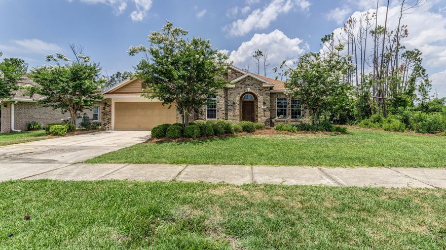 Like new  4 Bdrm/3 Bath Brick Energy Star Green home in the highly desired Hawk's Landing Neighborhood. This house was stripped down to the studs and completely updated/remodeled. The home sits on a large corner lot on a cul-de-sac surrounded by a nature preserve.  The home features hardwood look tile in the main living areas and carpet in all bedrooms, 10' ceilings, crown molding, upgraded lighting, pre-wired speakers for surround sound- audio/visual, and upgraded remote controlled ceiling fans throughout.  The kitchen will feature  42'' White wood cabinets, a six foot center island, granite counter tops, under cabinet lighting, GE Profile stainless steel appliances, gas range, and a walk-in pantry.  From the kitchen and family room you can access the 14 X 25 pavered screened porch through the 8' sliding French doors to enjoy the private preserve with family and friends. For your 4-legged family members there's even an underground fence to keep your best friend safe but give them access to all the sights and sounds of the neighborhood. Back inside the split plan master suite features a large bedroom and the master bath features his and her sinks, a jetted tub, a walk in shower, water closet and a huge walk in closet. The home has a large gas water heater that provides endless hot showers and plenty of capacity to fill that jetted tub and all of your other needs.  The brand new Trane 19 SEER variable speed heat pump + Trane Nexia touch screen wireless control system will allow you to access your home's temperature anywhere and offers the most advanced, energy efficient, and reliable HVAC system on the market. Enhanced humidity control is an additional benefit of the variable speed HVAC control technology so even on the hottest most humid days you will be cool and comfortable.  This home's roof is constructed with radiant barrier sheathing to reduce attic temperatures by up to 30 degrees vs conventional construction.  Combine this with the lawn sprinkler system's FREE access to the City of Lynn Haven's reclaimed water and you'll be extremely pleased with the consistently low utility bills. The Hawk's Landing neighborhood offers a convenient location with easy access to the 23rd St corridor, both military base's, the airport, and is zoned for Lynn Haven schools.  Don't wait call to see this home today.