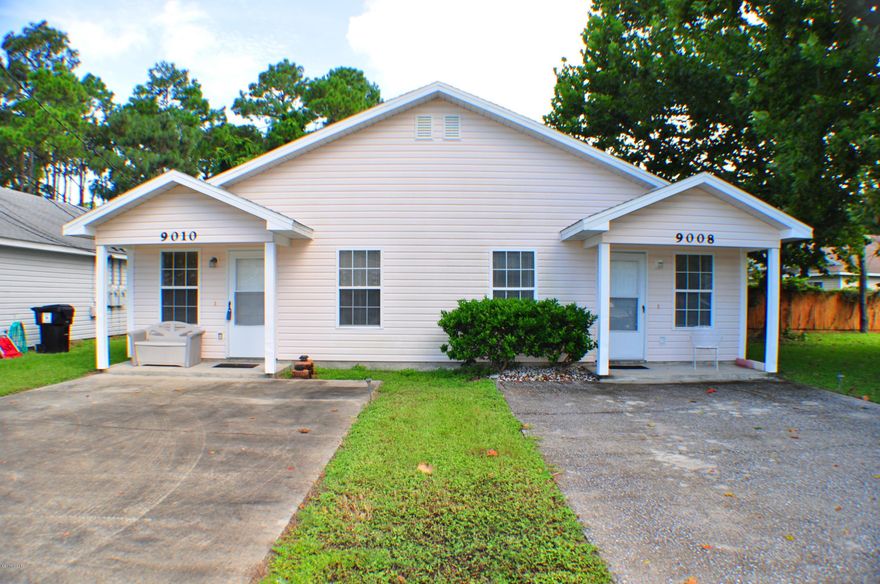 Great duplex in the heart of Panama City Beach just minutes from the beach, shopping, dining, and more!  There are 2-bedrooms and 1-bath in each unit.  Unit 9008 has new carpet in the bedrooms and living room while 9010 has ceramic tile flooring in the living room and a bedroom.  There are sliding glass doors in the back bedrooms that open to patios and a privacy fenced yard. This duplex is move-in ready and would make a great investment! Live in one side, rent out the other.  All info is approx. and must be verified by Buyers if important.