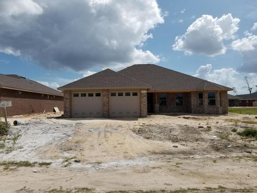 We have many new homes available  starting from the 250s. Construction almost complete on this 3 bedroom 2 bath all brick home that offers front porch, Master bath with his & hers double shower with Rain maker (3 shower heads) and shower seats on both ends, master large walk-in closet & sitting room or office. The kitchen is a dream with all real wood cabinets, solid surface countertops, walk-in pantry and stainless steel upgraded appliances. dinning, There are cabinets in the laundry room. Living room with and electric fire place and crown molding, double box ceilings, book shelves. Home comes with a security system and generator ready electrical outlet with cord. Outdoors there is an covered patio, outside shower and sprinkler system. Home is built to 140 MPH wind code.