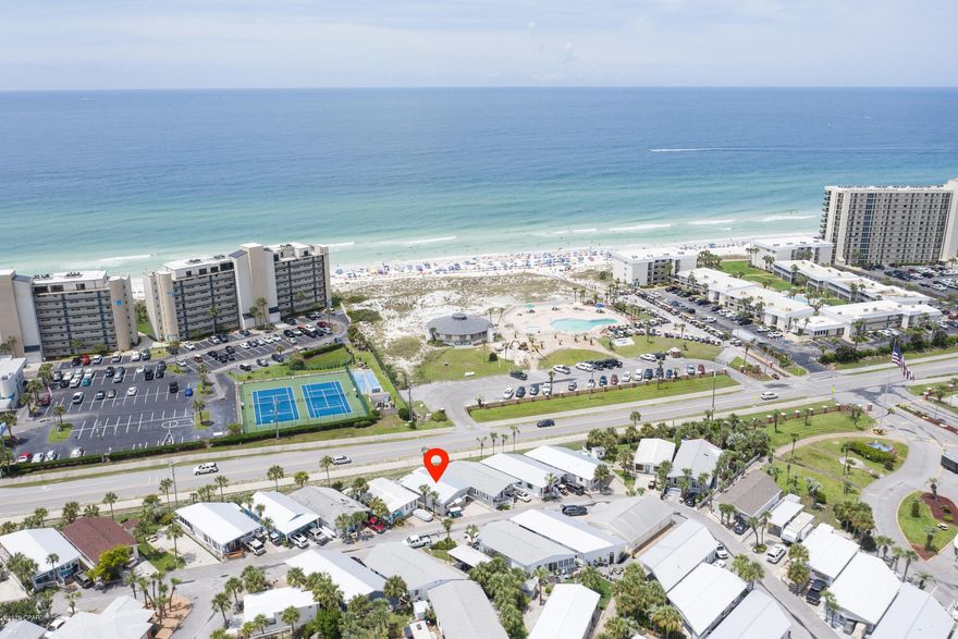 Rare opportunity to own in a premier location in Venture Out. This 2 bedroom, 2 bathroom home has been totally renovated including new roof and is filled with upgrades, top of the line appliances, finishes., and unique features. Chef's Kitchen features KitchenAid stainless appliances, oversize farmhouse sink, NEW Cooktop/Oven and custom designed vent hood. Providing scenic views of the beach and the Venture Out beachside pool complex properties in this location rarely come on the market. The large back patio with sweeping views features an outdoor kitchen with built in grill, burners and refrigeration.