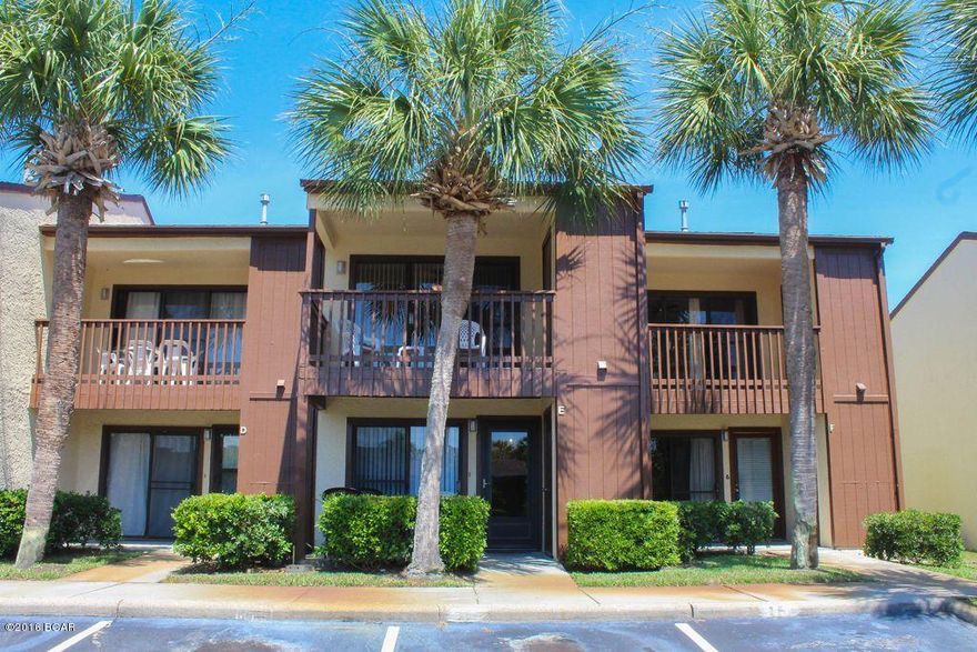 WHAT A DEAL on this Condo. Centrally located just West of Hwy 79 and near Pier Park. Minutes to the beach. This unit is fully furnished and has been recently updated. Wood look tile downstairs, carpet upstairs, new vanities in 2 of the bathrooms, newer kitchen cabinets, granite countertops and appliances.  A/C and hot water heater recently replaced in 2015/2016.  Unit is located just across from the pool. Low HOA's and excellent rental history. This is a MUST see!!!