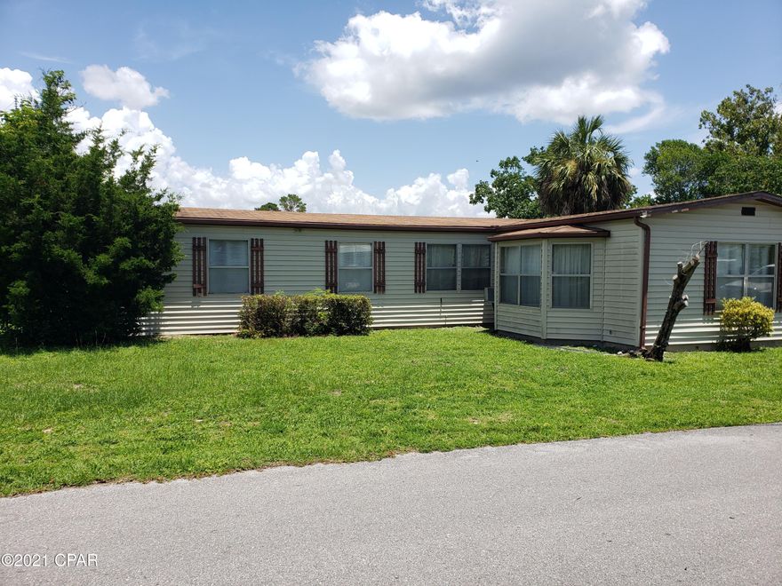 Great location near Panama City Beach.  Just a short walk to the beaches.  What an opportunity.  This home has water damage in the kitchen and along the north side.  That is why it is price so well.  The home has a construction addition (family room), and a detached carport.  The property need some repair but would make a great home afterwards.  The sellers said they are leaving everything so you have a furnished home.