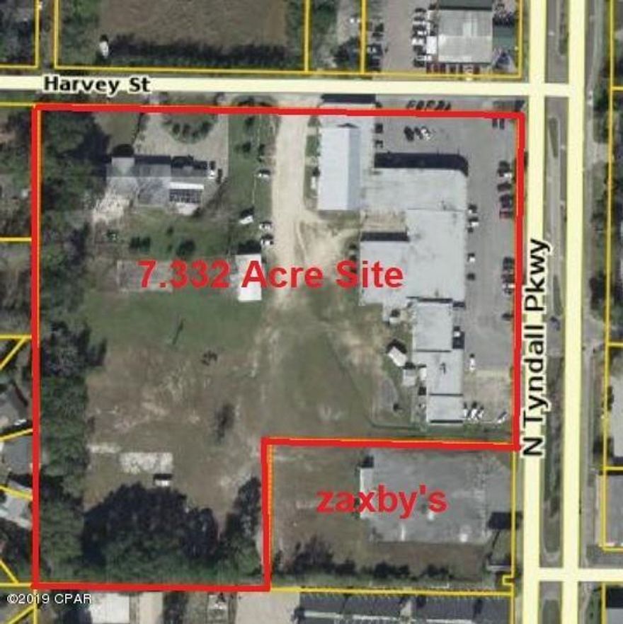 Excellent development site on N Tyndall Parkway, former site of Callaway Village Square Shopping Center plus additional land on Harvey Street totaling 7.33 acres. 430 feet on Tyndall Parkway.  Traffic Count on Tyndall Parkway 33,500 AADT.  The site also includes a home on Harvey Street (no contributory value)