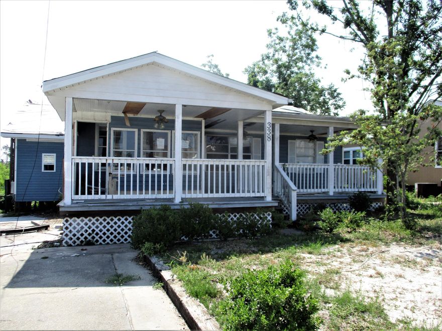 CURRENTLY UNDER CONTRACT, SELLER ACCEPTING BACKUP OFFERS  HUGE HOUSE in the Cove!!! Lots of potential, some tear out completed, vinyl siding replaced. Includes an upstairs bedroom/bathroom, with a separate entrance. Would make a great rental apartment! The main part of the house features 5 full bedrooms, 2 baths, a great open floor plan, large living room, very nice porches front and back! Formal living and dining area with what appears to be a recently renovated kitchen with large breakfast bar. Huge master suite with large bathroom, walk-in shower, large walk in closet. The upstairs bedroom/bath living suite is accessed from outside stairwell. If you're looking for a flip with loads of potential or if you need a huge house, this is the deal for you! Don't miss it today! Seller has priced