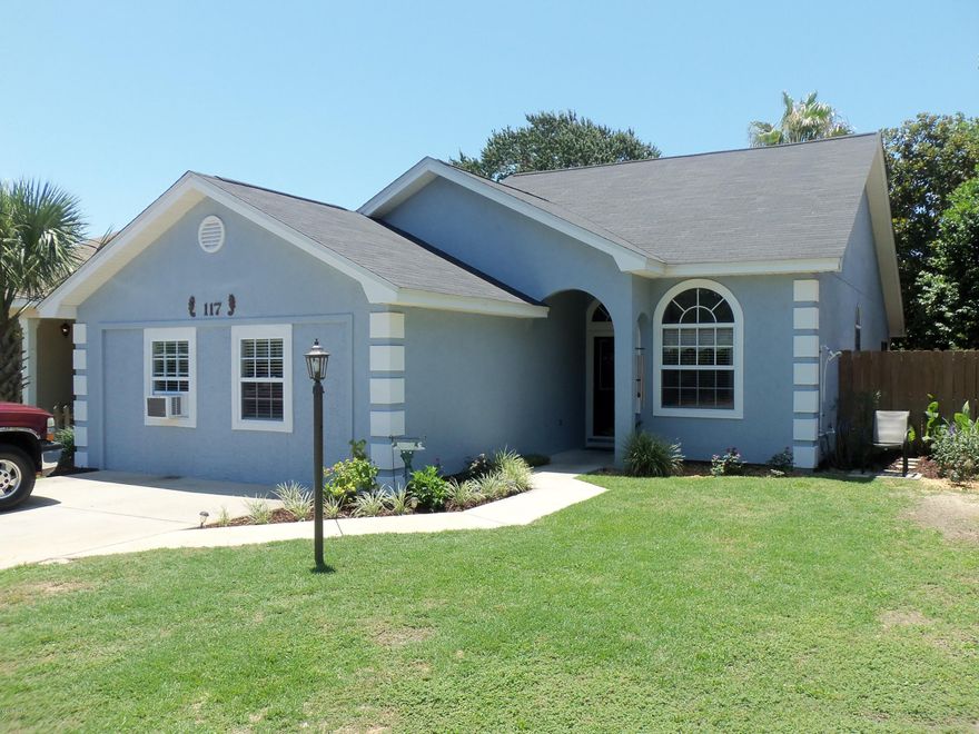 This a well maintained and upgraded 3/2 in Open Sands area. Home is located only 1 mile from Pier Park and only 2 blocks of Back Beach Rd(PCB Parkway). Interior upgrades include laminate and tile flooring in all rooms except spacious converted garage bedroom. Kitchen includes custom tile breakfast bar, custom wall finishing, high end stainless appliances including gas stove. The is very clean home and it shows pride of ownership. Please see photos to peak at the upgrades. Other upgrades include French doors with built in shades exiting into screened porch, block glass side light on rear French doors, paver deck outside of screened porch, and outside workshop. This home is priced to sell and is in excellent condition. All sizes and info should be verified if important!!