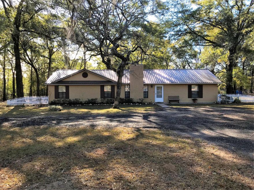 Check out this REMODELED 4 bedroom 2 bath on 1.3 acres!! One bedroom has a 9x15 bonus room that could easily be another bedroom, nursery or office. Kitchen has been upgraded, new water heater, new ceramic shower in master bath. Enjoy the open floor plan with a beautiful wood burning fireplace. There is a 36x24 pole barn and a 18x40 detached carport. This is a very well laid out home with a huge yard and in a great neighborhood!!