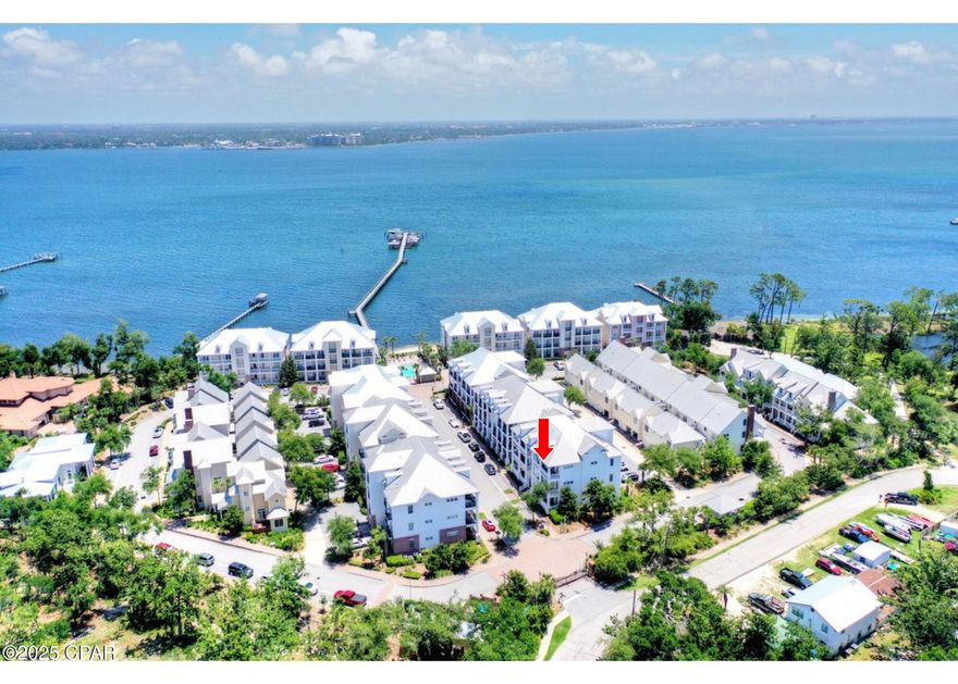 Water front community located directly on St. Andrews Bay. Waterhaven is a gated, non-rental community unlike any other. 

The beautiful, formal entry leads to this first floor, 2 bedrooms, 2 bath condo. This open-concept living/dining area leads to a high-end kitchen including a Sub-Zero refrigerator, Viking 6 burner gas range, Bosch dishwasher, ice maker and wine chiller at the wet bar. Water system added and HVAC replaced in 2020. 

The laundry/pantry door leads to the back-side parking and elevator. There is also extra storage for this unit conveniently located on the top floor. From the hardwood floors to the trey ceilings and crown molding throughout, you'll want to call this house your home. 

Enjoy the bay view lounging at the pool or enjoy a walk along one of the largest private piers in the area. Club house includes theater, meeting room, kitchen, fitness center and outdoor kitchen. HOA management office is also located in the Club House. Come see this one-of-a-kind community.