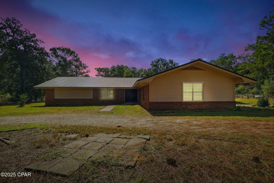 Charming Ranch-Style Home on 2 Acres Welcome to your dream ranch-style home, perfectly situated on two expansive acres of land! This stunning property offers endless possibilities for customization and expansion to suit your lifestyle. Located in an ideal area, you'll be just a short drive away from beautiful beaches, serene lakes, and a plethora of recreational activities. This spacious home features 4 bedrooms and 21/2 baths, making it perfect for those who love to entertain. The thoughtfully designed split floor plan provides privacy for the large master suite, complete with two large closets for all your storage needs. The interior has been recently updated and freshly painted throughout, creating a bright and inviting a atmosphere.