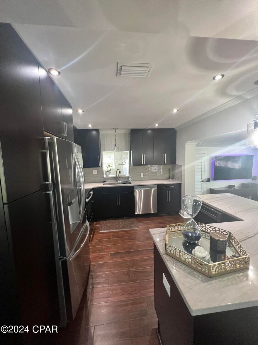 3 Bedroom/ 2 bath home located in the center of town! This home sits minutes from restaurants, grocery, shopping and more! Move in ready, featuring a fully fenced backyard! Home features Hunter Douglas smart blinds, Ecobee, Vivint alarm system. Inside you will find tile flooring throughout. Open concept kitchen/living, quartzite countertops, kitchen bar, stainless steel appliances, and wine cooler. Master bedroom features floating vanity, walk in closet, jacuzzi and walk in shower. Call to schedule your private showing today!