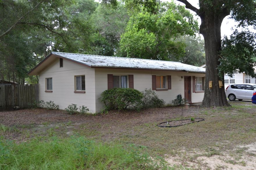 Very cute and affordable home located in a growing area, close to shopping, restaurants, HWY 231 and the new schools being built. This home is open and feels much larger than it actually is with 3 bedrooms, 1.5 baths it is perfect for the growing family or the bachelor. Nothing is needed, the metal roof is new, the A/C and water heater have been replaced and the home has durable laminate floors and concrete block walls. Come see for your self what this one has to offer but don delay! Call your Realtor today! This area is growing fast and property values will continue to increase.