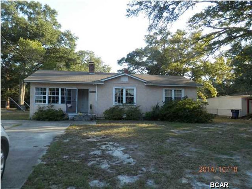 4 bedroom walking distance to schools, Living room has wood burning fireplace, kitchen with dining area. Older home in need of some updates. Lot has an alley to access the back yard. Easy to show call for appt. Conveyance of this property shall be by Special Warranty Deed or local equivalent.