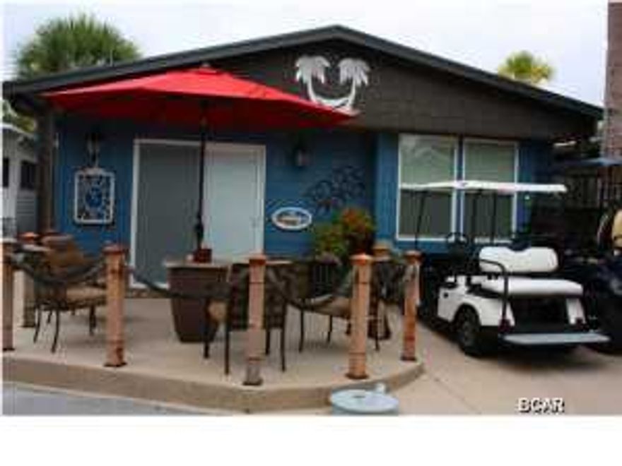 Prepare for fabulous! That's what you will find in this unique Venture Out home. This beauty was just completely remodeled from top to bottom. This 2 bedroom 2 bath home has had an extensive renovation and is considered conventionally constructed according to county assessor. This home is loaded with granite, stainless and is being sold furnished. The kitchen is open to the living area giving this home a desirable open floor plan. You will also love the convenient outdoor shower. Venture Out is a unique golf cart community that offers 300' on the Gulf and 1,000' on the Grand Lagoon. The resort has two pools, tennis courts, putt putt, fishing pier, boat dock, boat ramp, playground and much more.