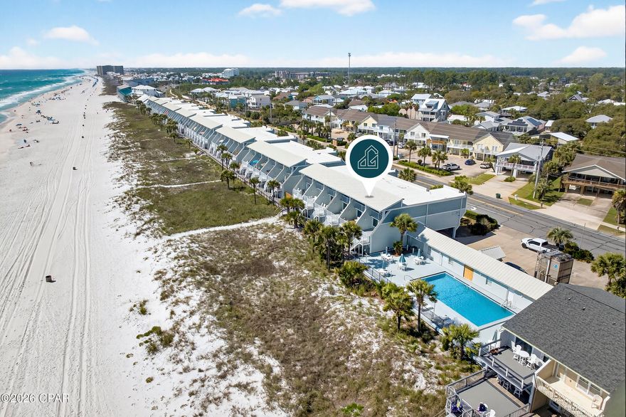 Positioned on the sugar-white sands of Panama City Beach's sought-after quiet West End, this beautifully updated 3-story gulf-front residence in The Shores Townhomes offers a rare blend of modern coastal design and effortless beachfront living--just steps from the sand.

Over $108,000 in recent 2024/2025 renovations have transformed the home with a clean, modern coastal aesthetic, including new windows, doors, siding, stairs, and decking. The dune restoration was completed separately by the association, further enhancing the beachfront setting and long-term stability of the property. These updates not only elevate the look but reinforce the low-maintenance, high-demand appeal of this gulf-front community.

Inside, the kitchen has been fully reimagined with quartz countertops, new 2025 appliances (including a stainless induction cooktop, refrigerator, and dishwasher), a designer mosaic tile backsplash, shiplap detailing, and generous cabinetry. Bathrooms were updated in 2026 with new tile and quartz countertops, creating a consistent, refined finish throughout. Luxury vinyl tile flooring runs through the main living areas--durable, low-maintenance, and well-suited for coastal living.

The three-level layout is designed to balance privacy and gathering space. The top floor is dedicated to the gulf-front primary suite, featuring a spacious walk-in shower, private balcony access, and unobstructed water views. The floorplan has been enhanced to include a bunk room and a large closet, adding flexible sleeping capacity and storage, with space available to add another bathroom if desired.

The second level serves as the main living space, where an open-concept kitchen, dining, and living area is filled with natural light and framed by expansive gulf-facing windows. A large beachfront deck extends the living space outdoors. A guest bedroom and full bathroom complete this level. The home is offered fully furnished, including new 2026 patio furniture and bedroom sets, along with Restoration Hardware furnishings in the main living area, creating a clean, turnkey coastal presentation.

The ground level includes a private enclosed two-car garage with built-in storage for beach gear, along with laundry and convenient interior access.

Key improvements--including hurricane-impact windows and doors and a new HVAC in 2025--provide long-term durability and year-round comfort.

Located just one unit from the community pool, this home enjoys one of the most convenient positions within The Shores Townhomes--a low-density, 52-unit gulf-front community offering approximately 1,000 feet of private beachfront, a gulf-front pool, and a sense of space rarely found along the coast.

Just minutes from both 30A and the best of Panama City Beach, including Rosemary Beach and Pier Park, this is a rare opportunity to own a fully updated, move-in ready gulf-front residence in one of the area's most desirable coastal settings.

Private showings available upon request.