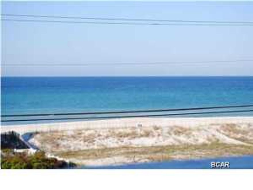This beautiful 3 story beach cottage is located a leisurely 2 minute walk from Pier Park and directly across Front Beach Road is 200 feet of VACANT BEACHFRONT with an unobstructed view of not just water, but the beach. The owners and guests frequently see dolphins feeding or ''surfing'' in the morning or afternoon. So this not only has LOCATION it has a million dollar view. This is truly a beach home furnished with beautiful quaint beach dcor all of which conveys with the property. All floors in the bedrooms and living areas are engineered bamboo including the stairs. The three baths that are adjacent to the bedrooms are tile. The home is not only fully furnished ready for owners or renters, but has an incredible surround sound system in the living area. The garage is insulated and