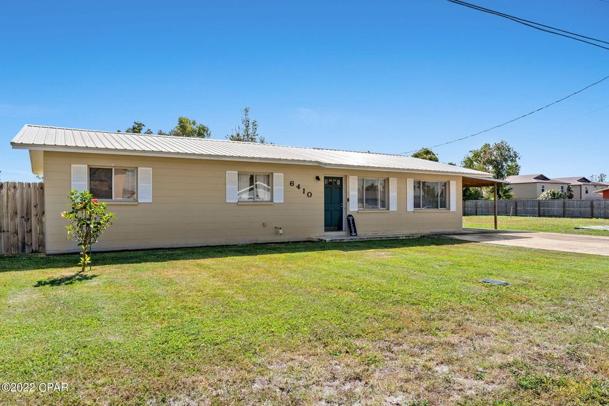 Currently under contract, but seller will consider back up offers.  This sturdy concrete block home has 4 bedrooms and 2 bathrooms along with an inside laundry room.  The exterior is perfect for entertaining.  There is a covered deck, 2020 Mirage 24 ft round above ground pool (52 inches deep), 2022 pool pump, fire pit and storage shed.  The yard is fully fenced in with a double gate.  The inside has lvp flooring throughout, new light fixtures and ceiling fans.  For parking there is a car port.  The metal roof is 2013, the AC is 2022, and the water heater is 2022. Make plans to see this home today.